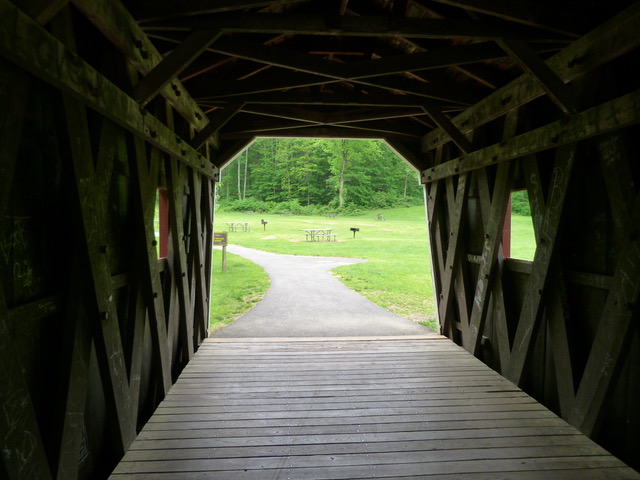 insid ewooden covered bridge on road trip