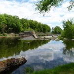 River scen with reflected sky seen on road trip