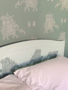 taking stock headboard decoupaged with elephantsts