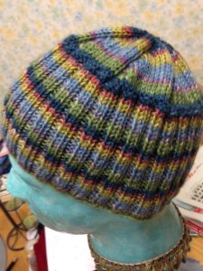 Green striped beanie hat