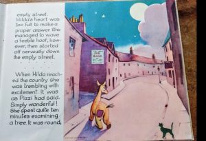 Story illustration showing pantomime horse and black cat